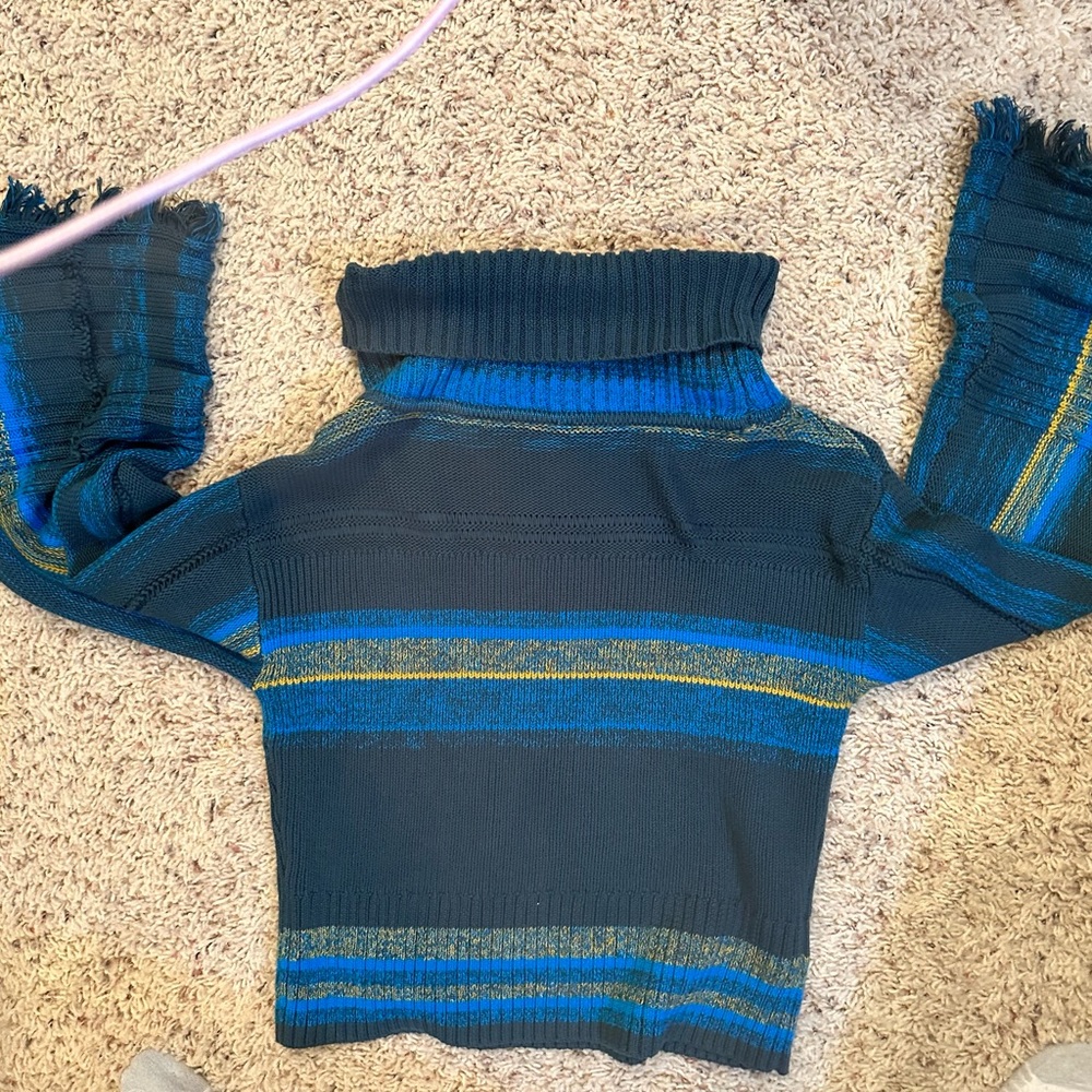 Small free people sweater with tassels on wrist. turquoise and yellow stripes.